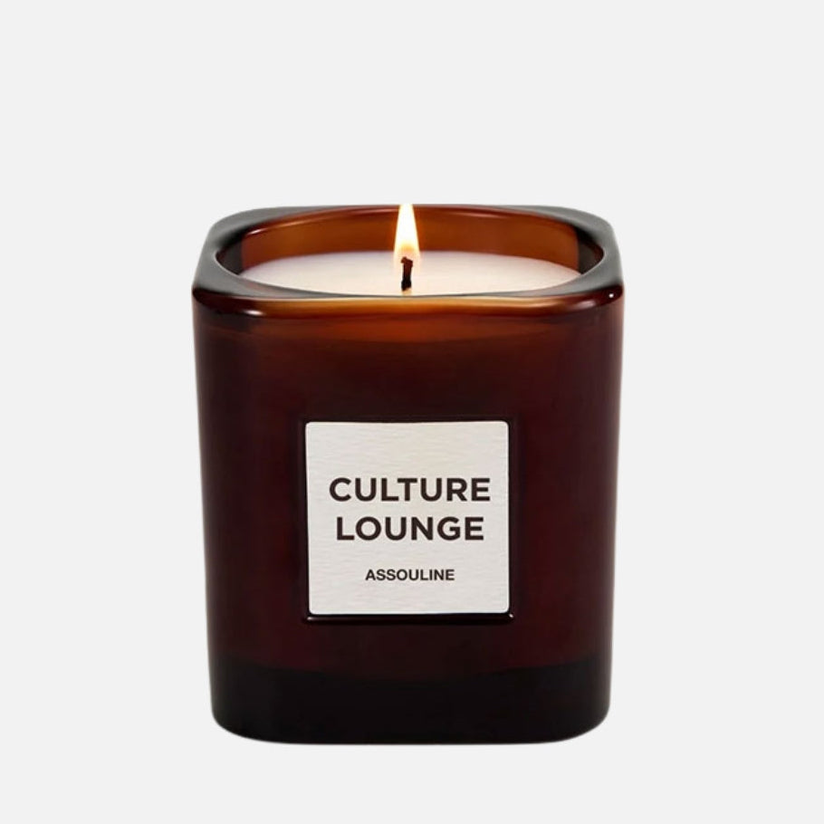 Candle in a brown container with 'Culture Lounge' label on a white background