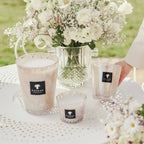 Baobab Collection Pearls White 4-wick scented candle in mouth-blown glass, 1.1kg, styled in a room setting 2