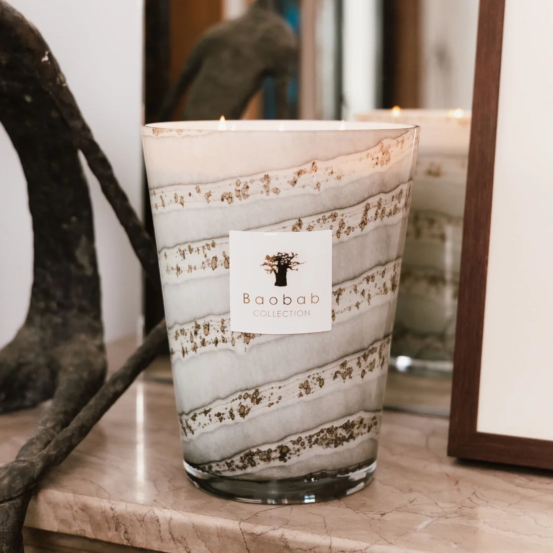 Baobab Collection Sand Atacama 4-wick scented candle in mouth-blown glass, 1.1kg, styled in a room setting